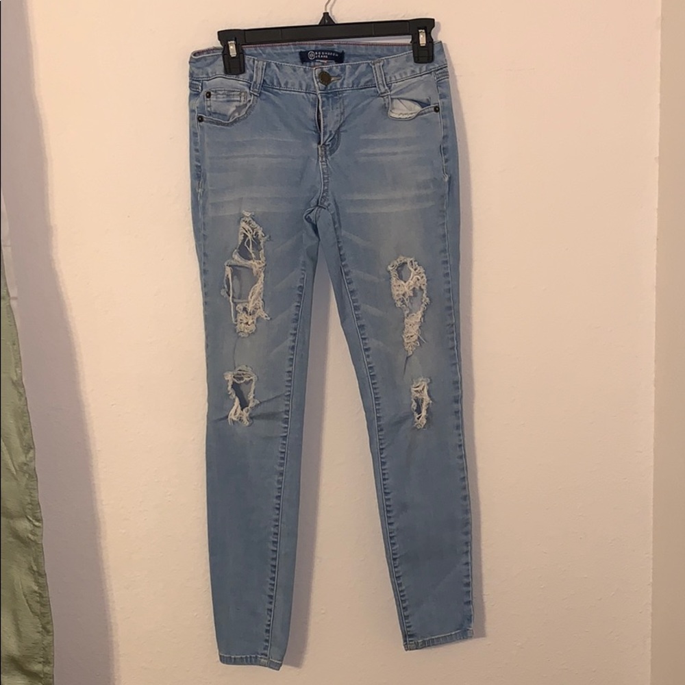 Light Denim Distressed Skinny Jeans